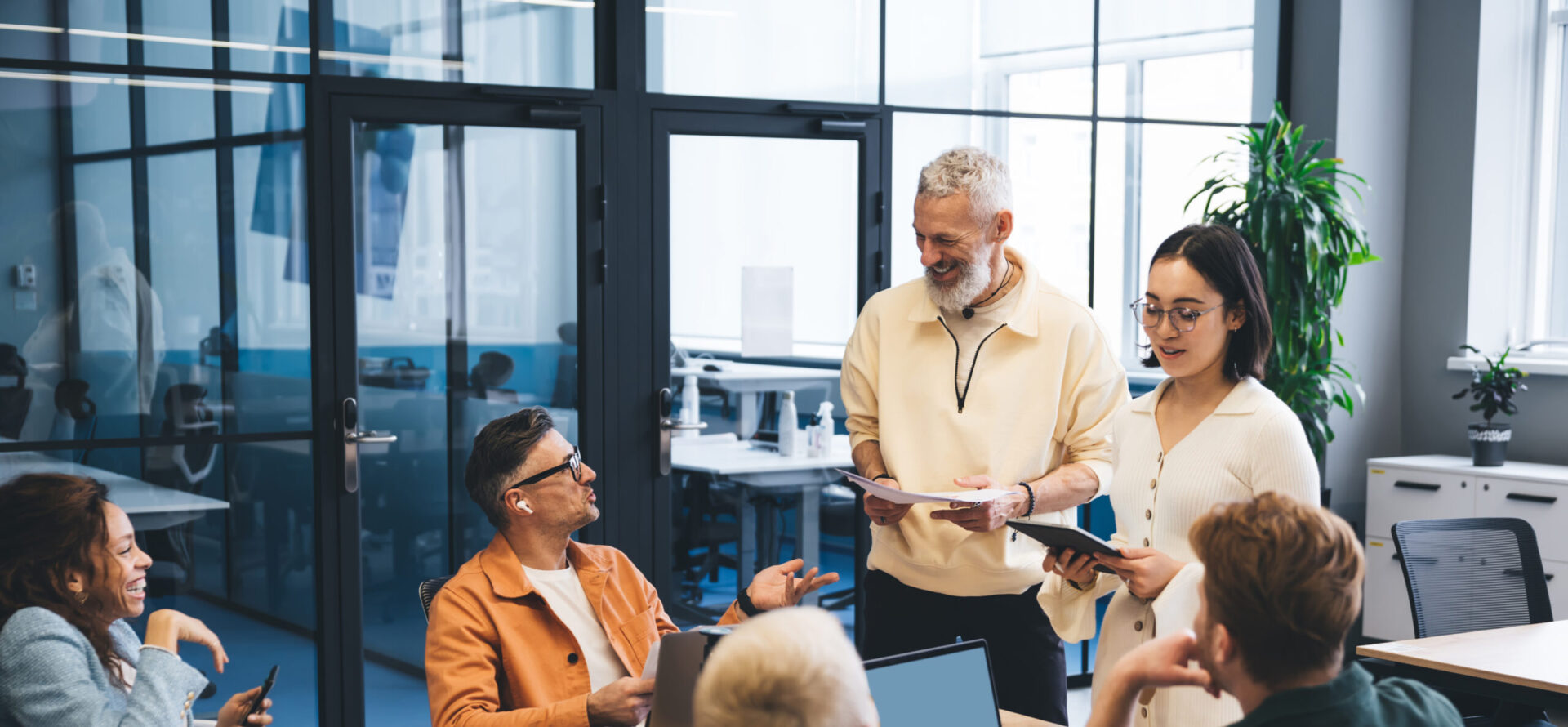 Group Of Diverse Business Partners Brainstorming In Conference Room